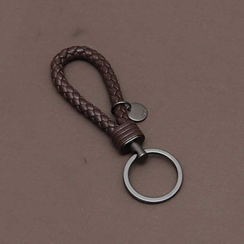 Keyring preto de arma de café