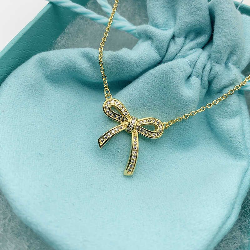 Bow ketting goud (met diamant)