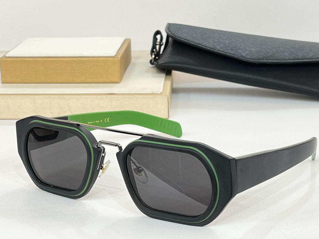 Black green frame grey lens