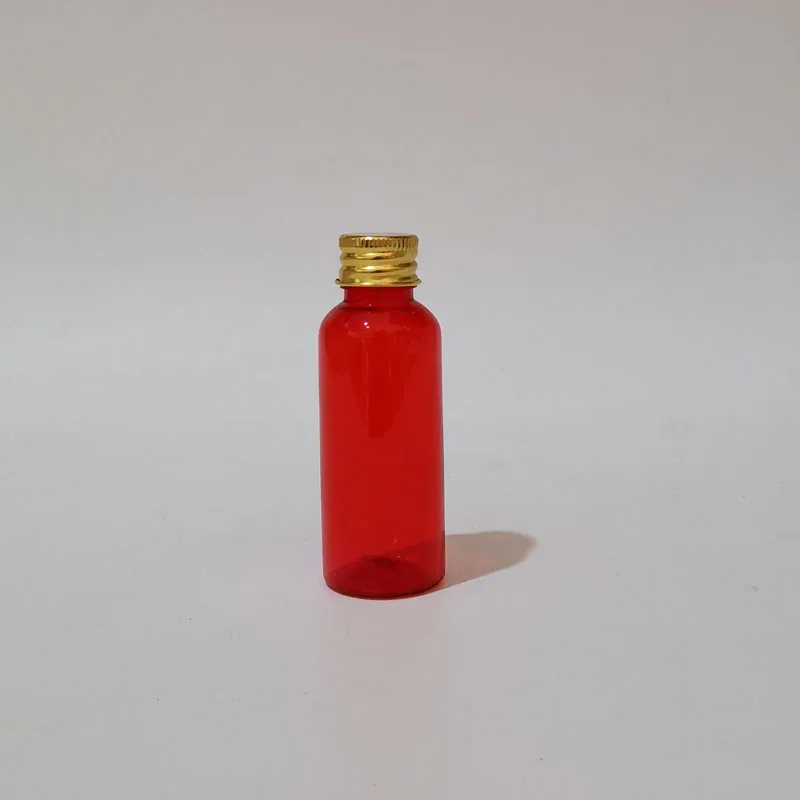 Bottiglia di plastica rossa da 50 ml color oro