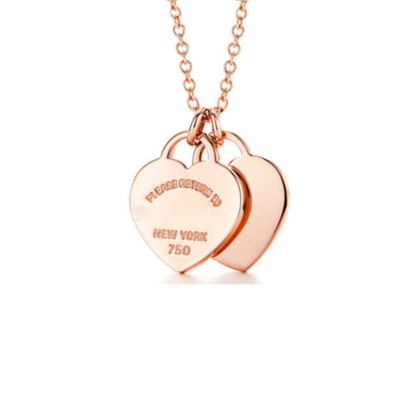 Doppi cuori in oro rosa-argento 925