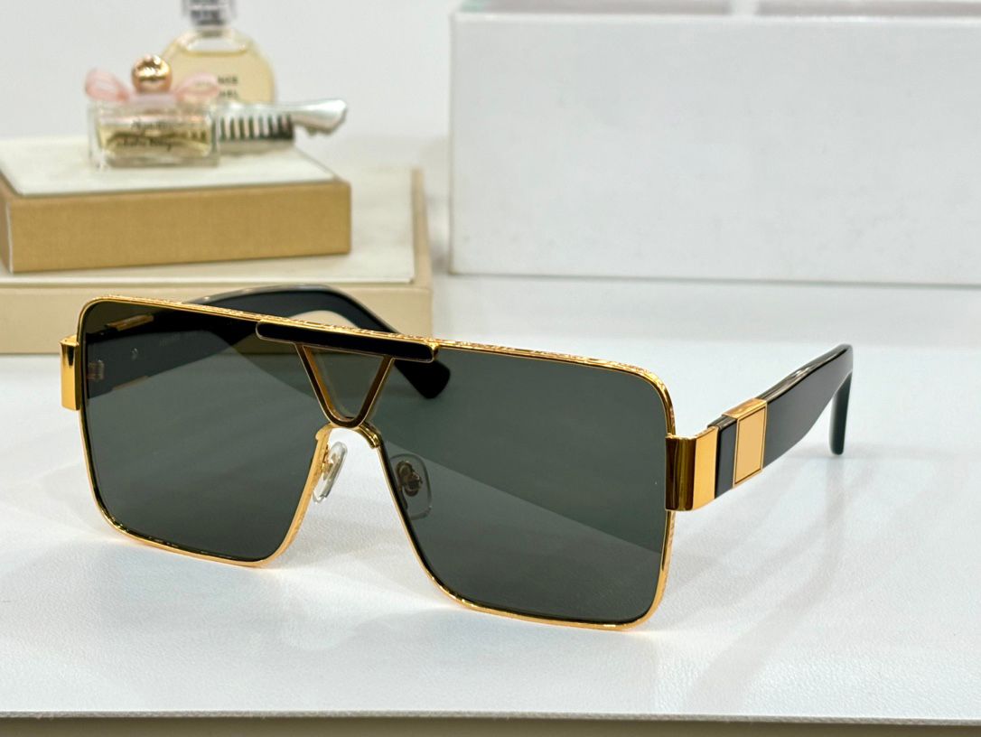 Gold frame grey lens