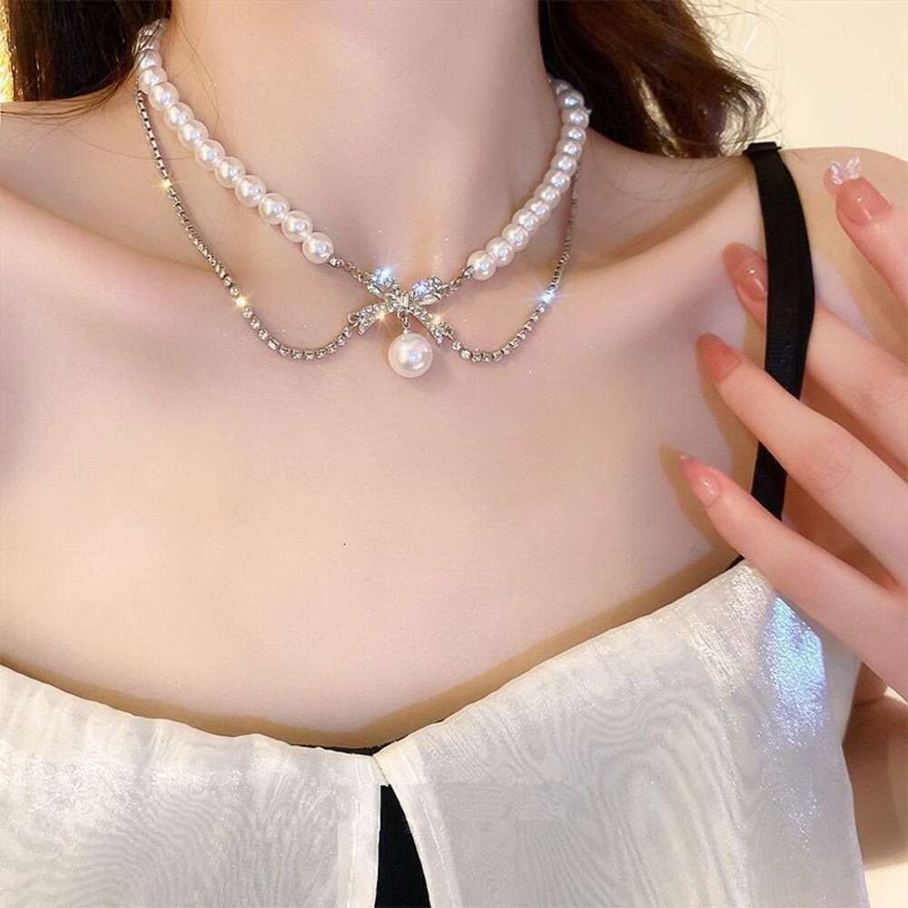 Butterfly pearl necklace