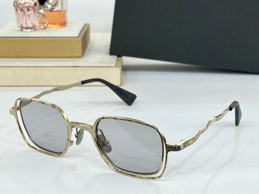 Gold Frame grey lens