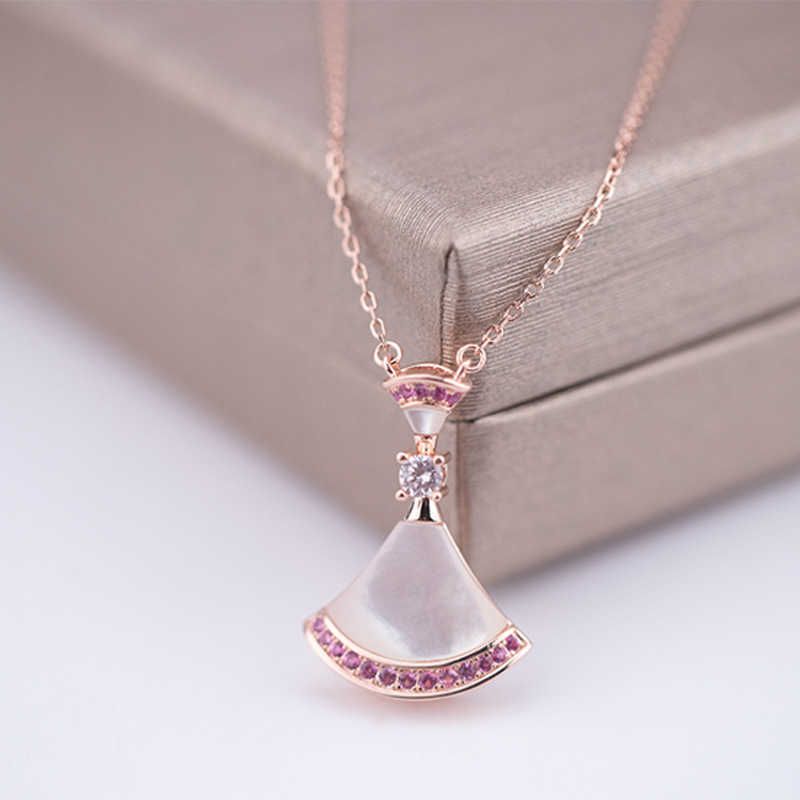 Coquille blanche de diamant en poudre d'or rose-L