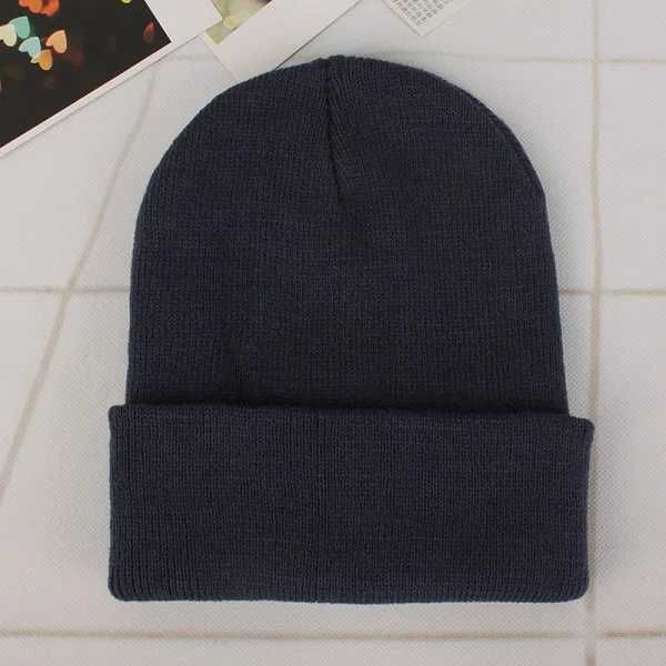 Mörkgrå beanie.-fri storlek (55-60 cm)