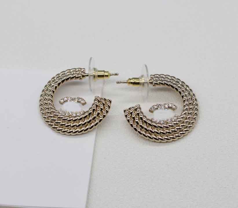 001 boucle d'oreille + boîte