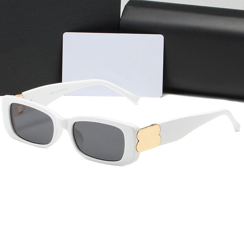 White frame grey lens