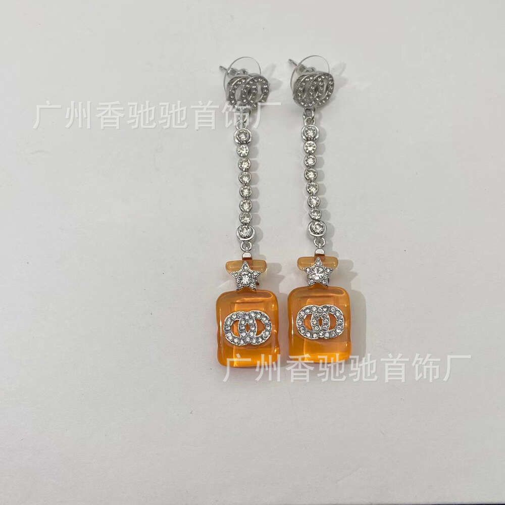 Boucles d'oreilles oranges 1