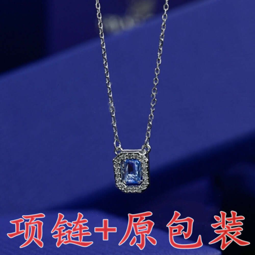 Witgouden halsketting met blauwe diamant+origi