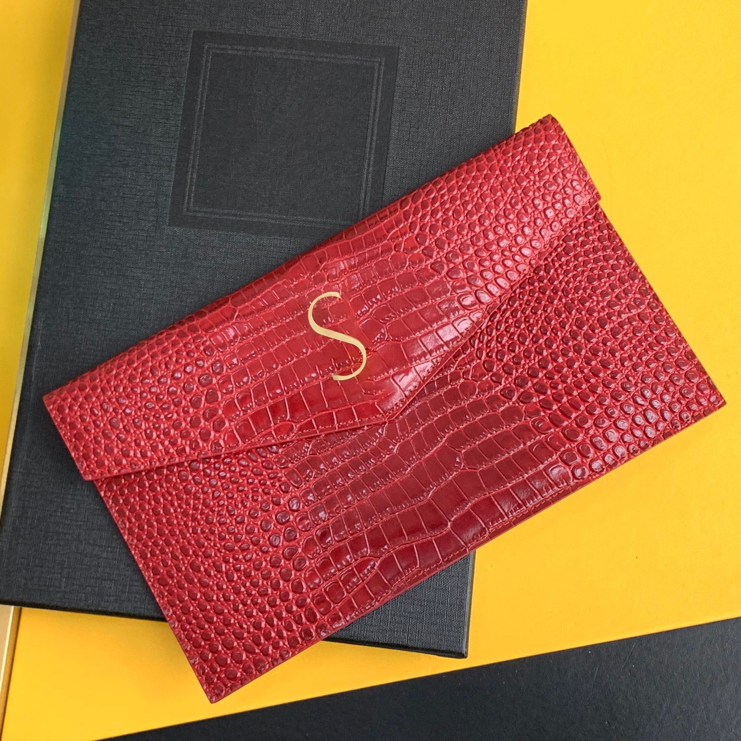 Red crocodile patterned gold buckle