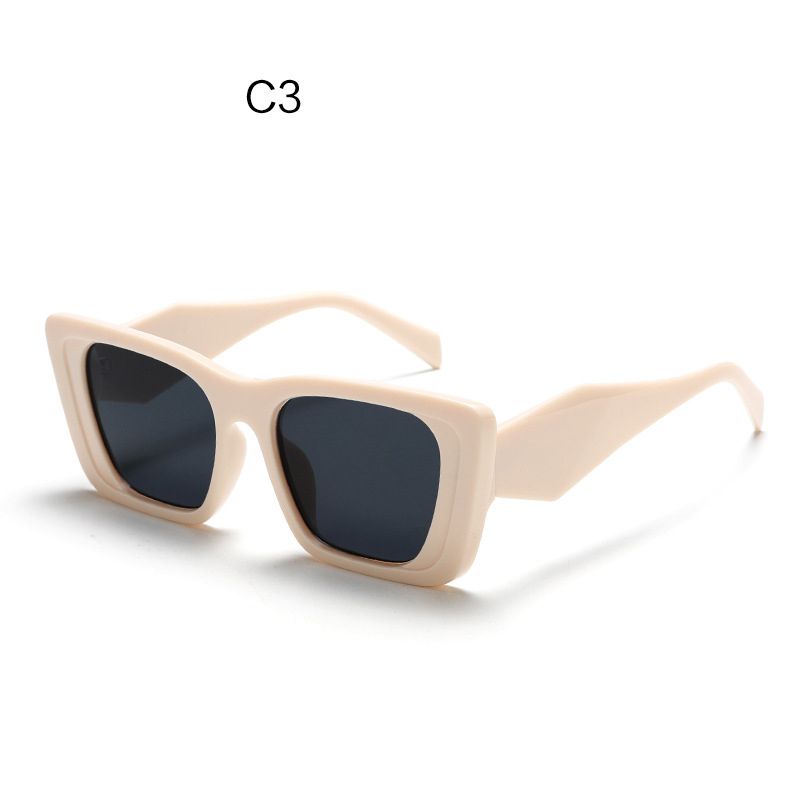 C2 beige framed gray lenses