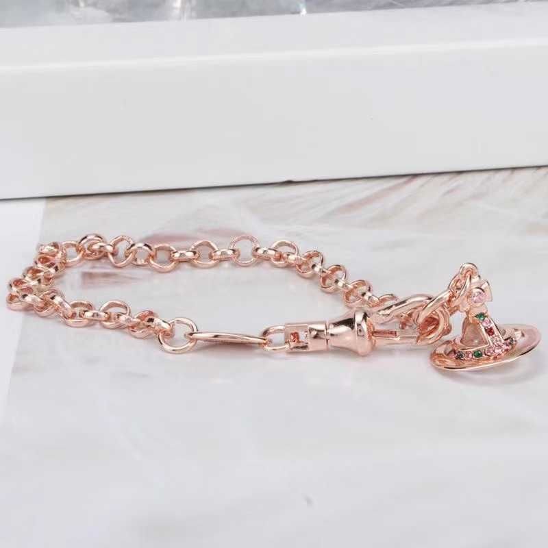 Bracciale in oro rosa con perline bianche