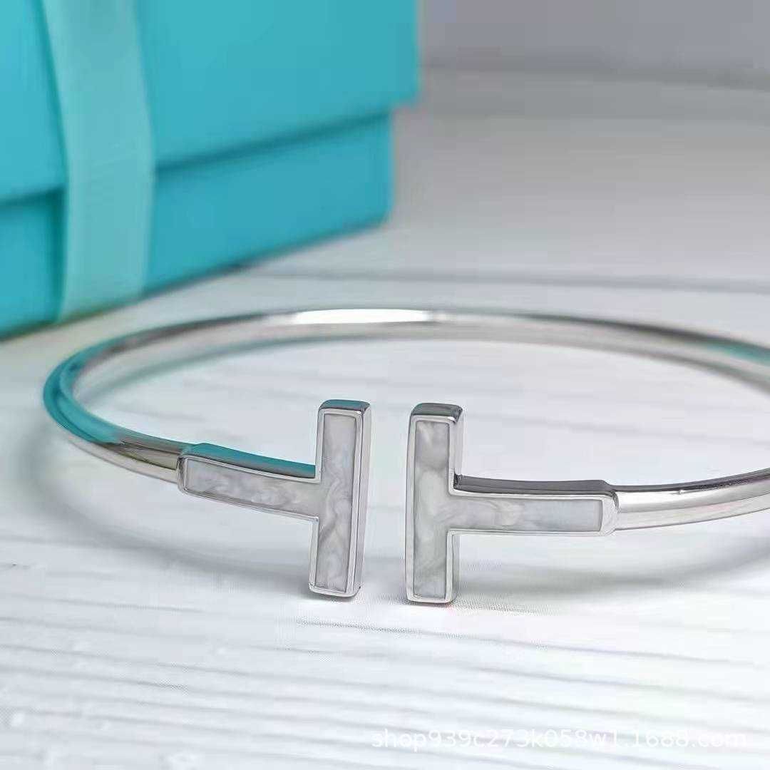 Bracelet à double coque blanc en platine