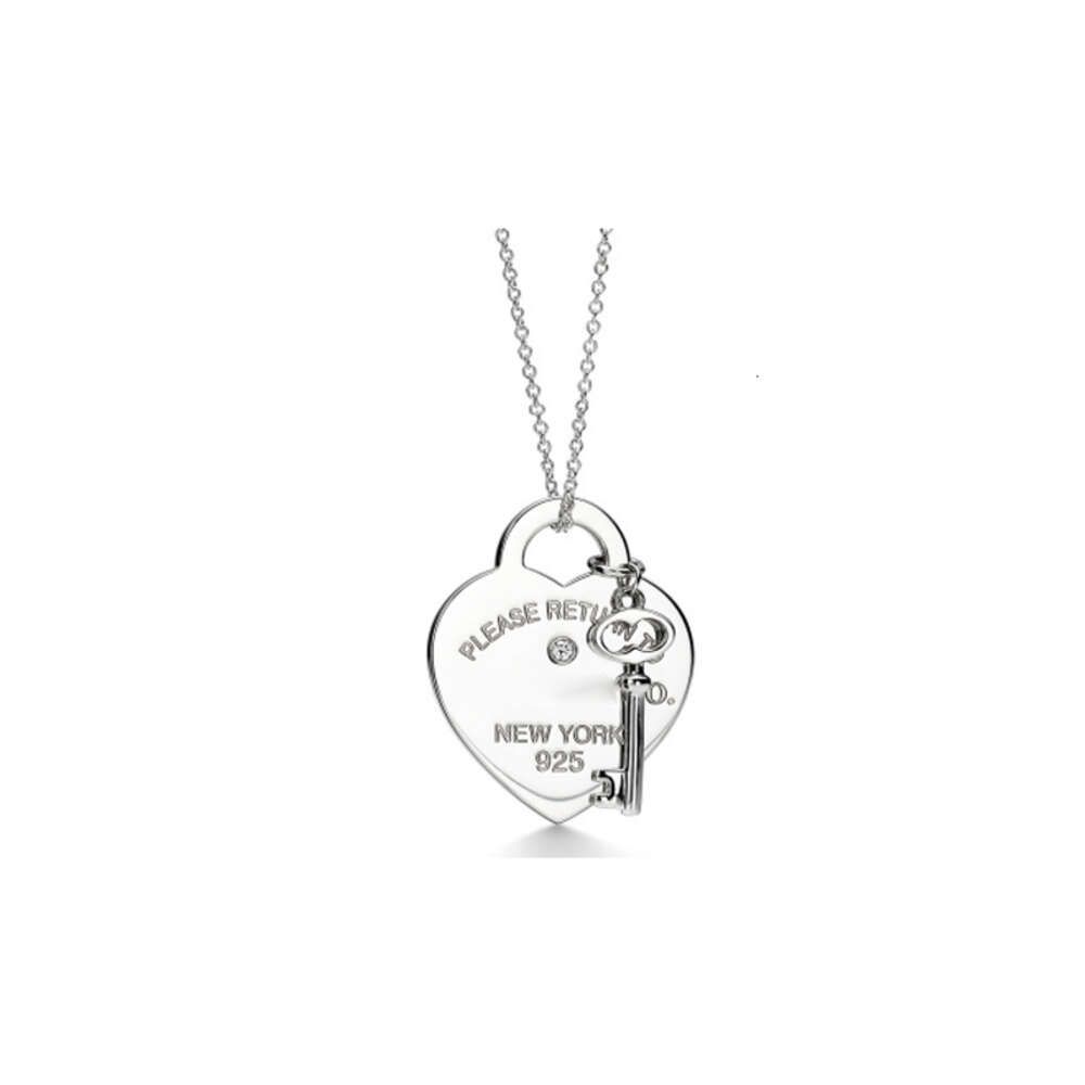 Heart Shaped Diamond Set Key Silver-92