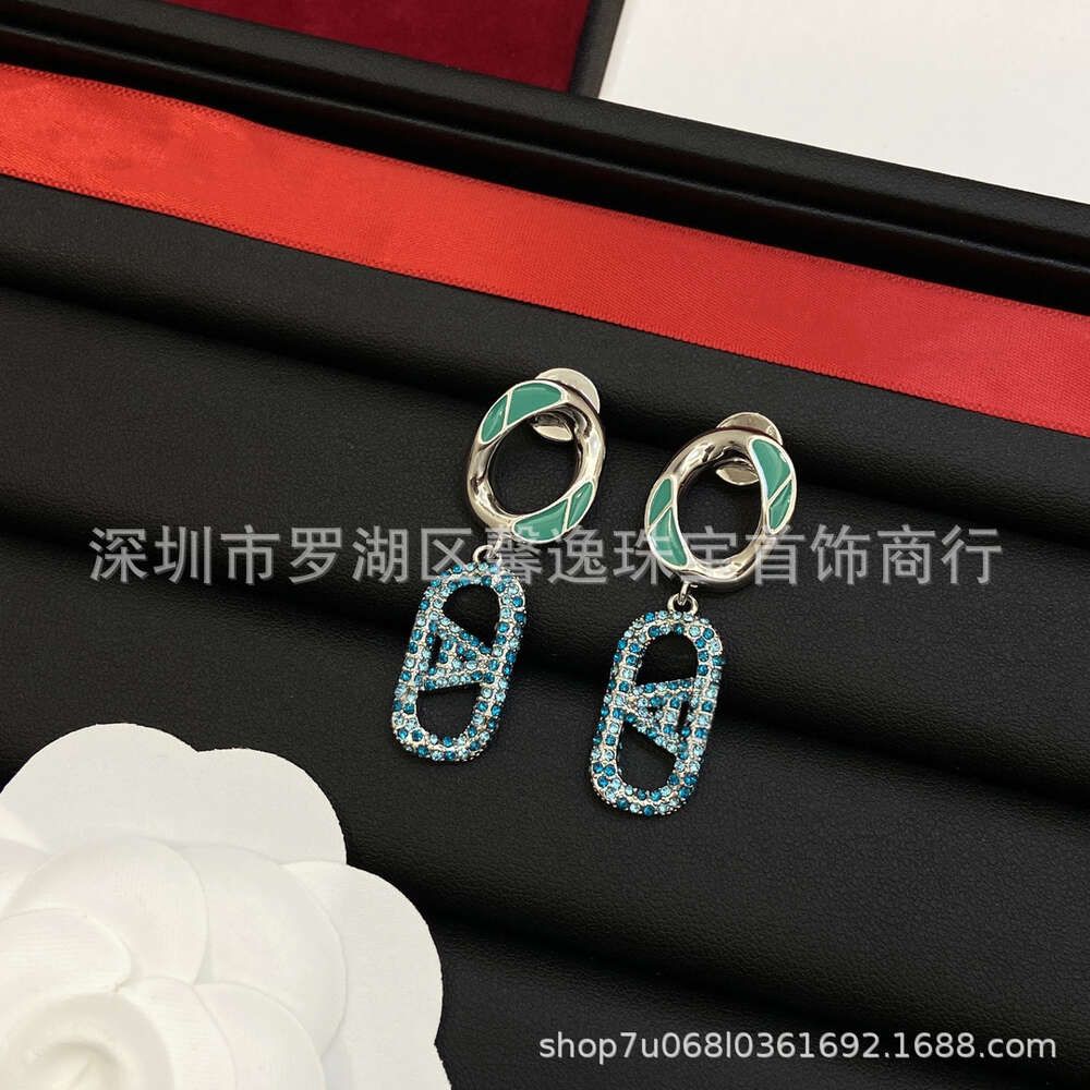 Blue Earrings Correct Letters