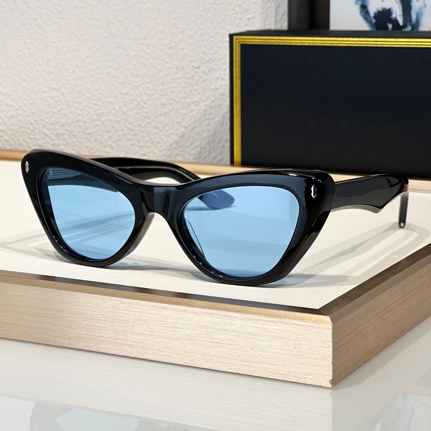 Black frame blue lens