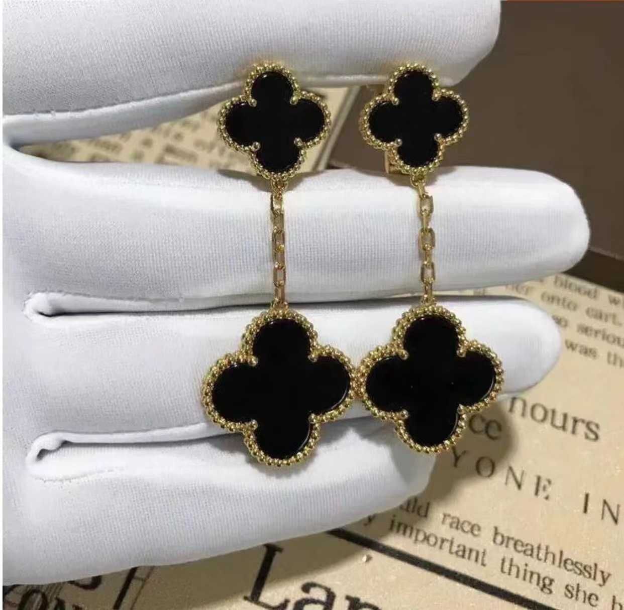 Gold Black Agate Ear Clapper