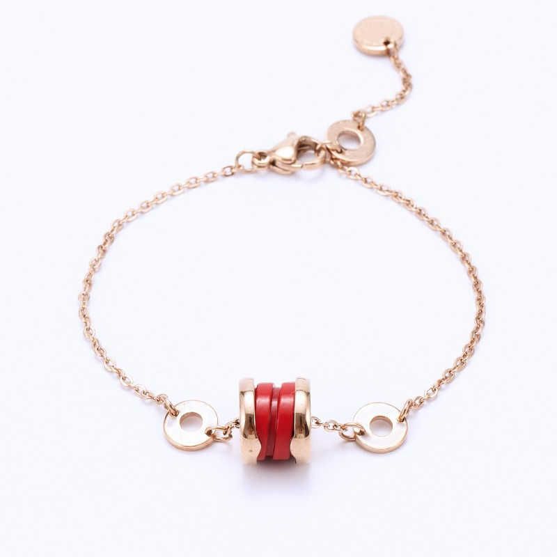 Céramique rouge or rose. Bracelet Baojia