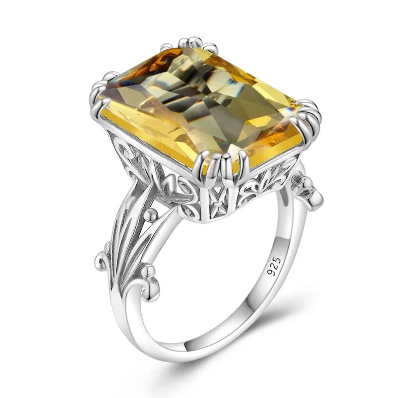 Bague en or blanc et cristal jaune