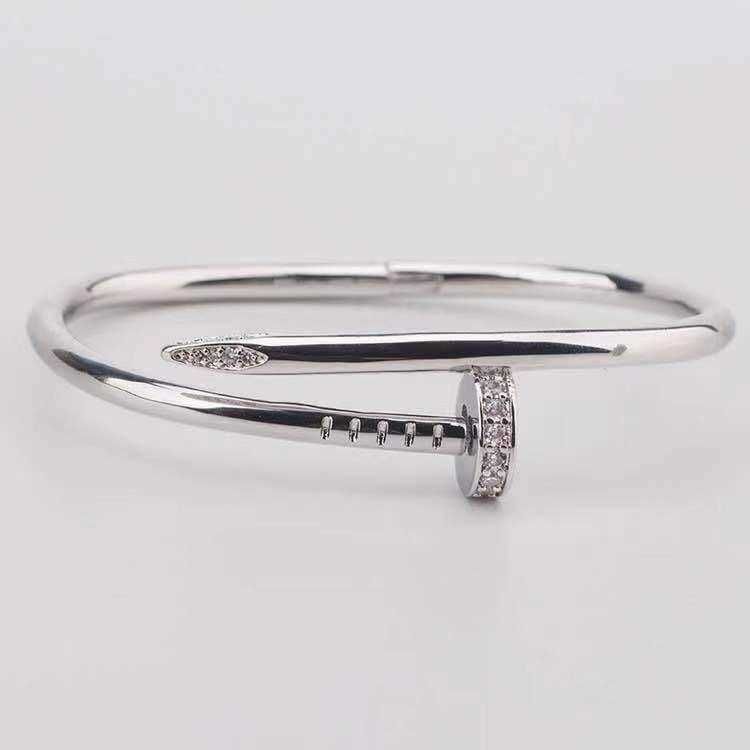 Bracelet à ongles clouté de diamants en argent (