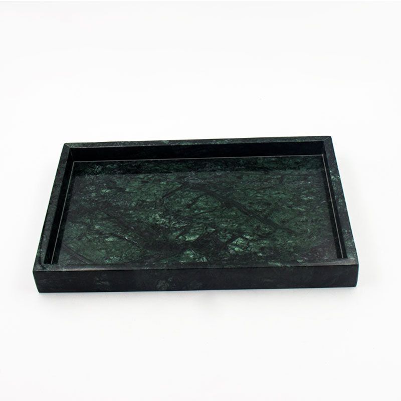 Tray with concave edge