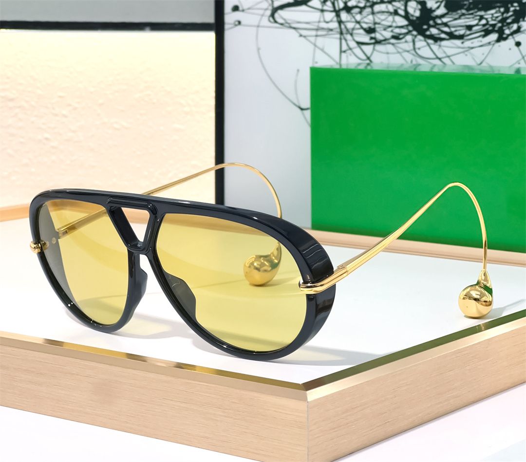 1273 black frame yellow lens