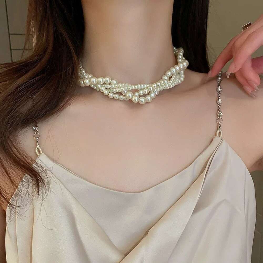 9 # Necklace. White multi-layer pearls