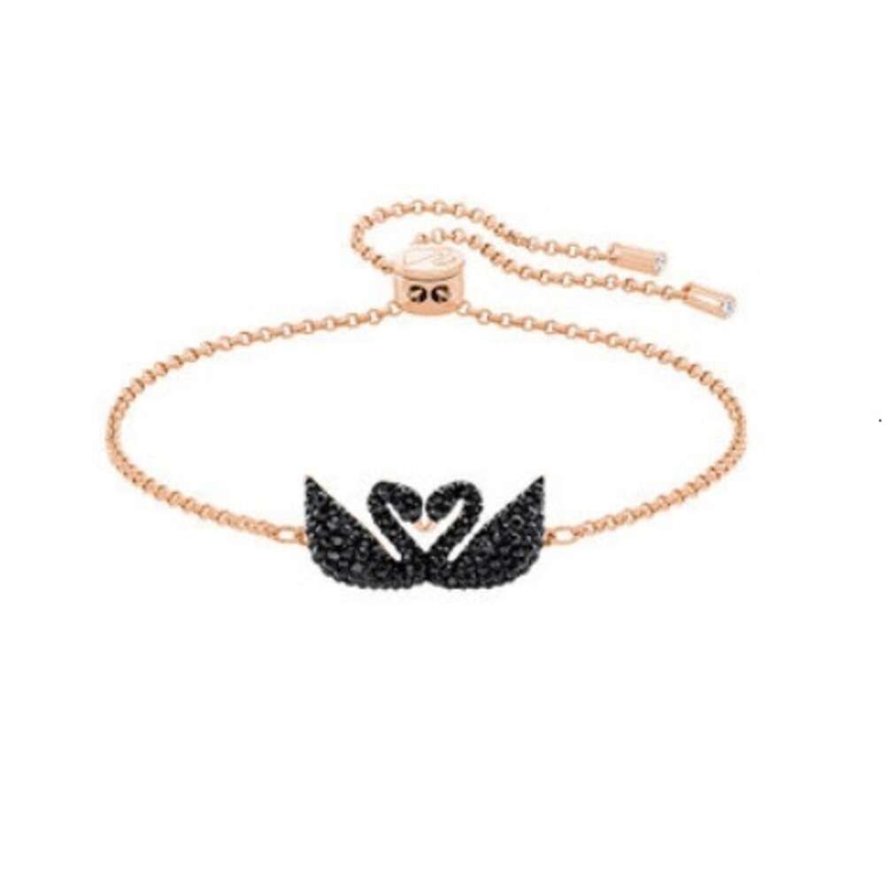 Bracciale con doppio cigno nero in oro rosa