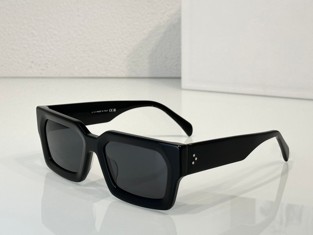 Black frame grey lens