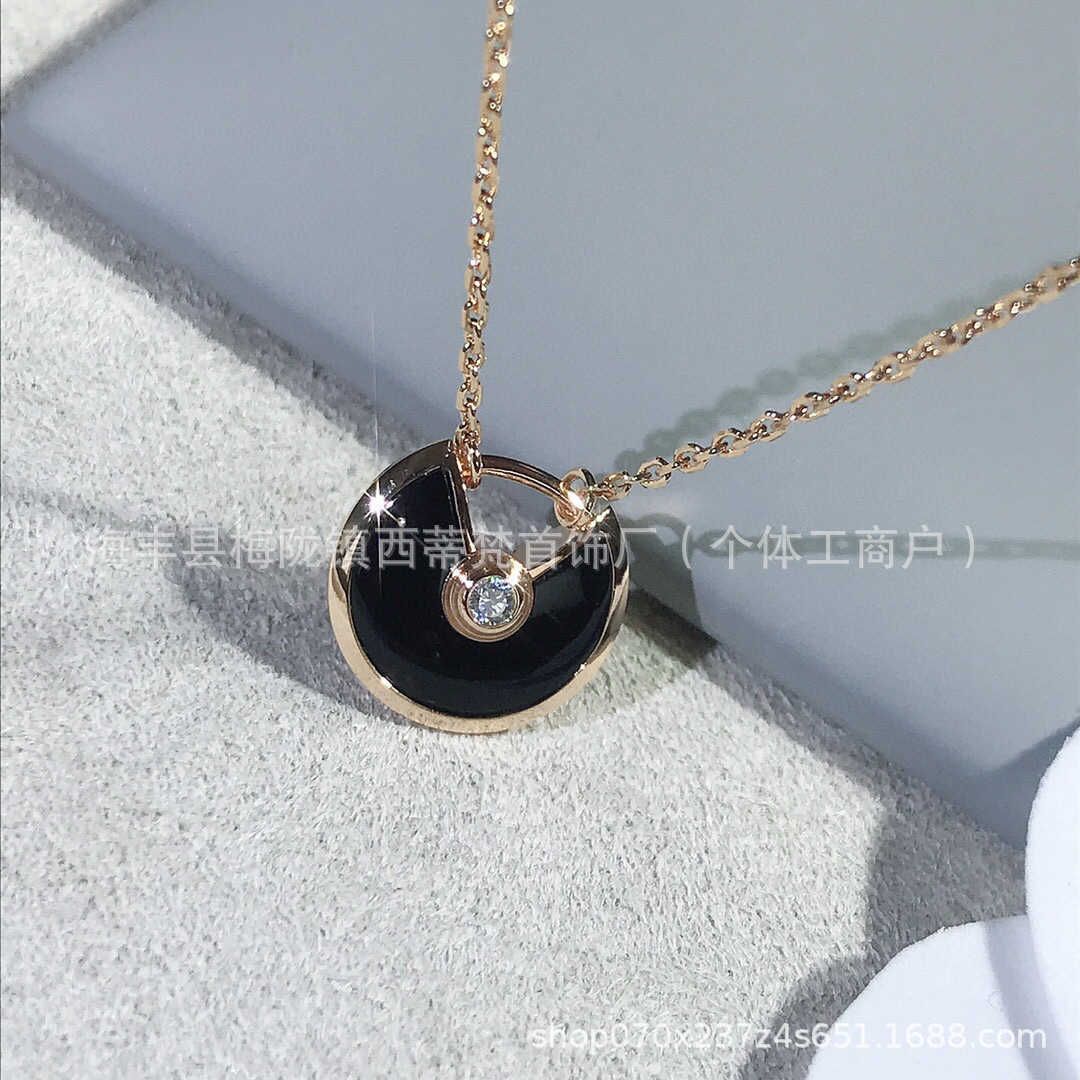 Rose Gold Black Agate Amulet