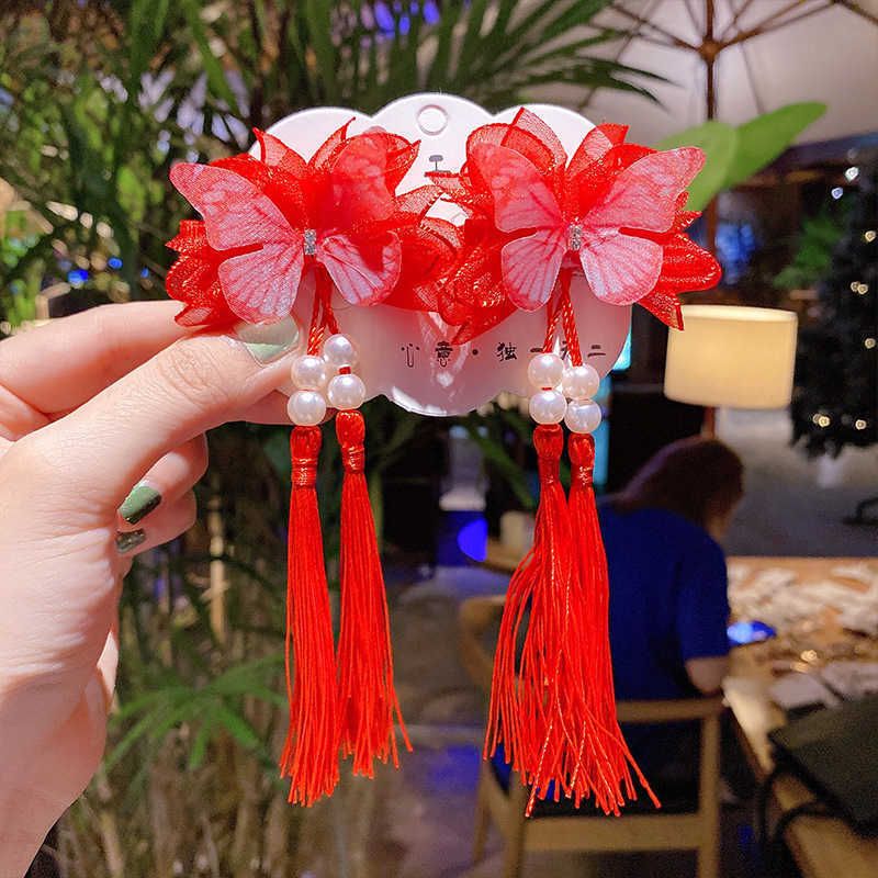 23 # a Pair of Red Butterfly Tassel Ha