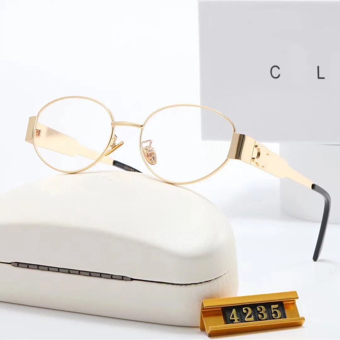 40235U Gold framed transparent lenses