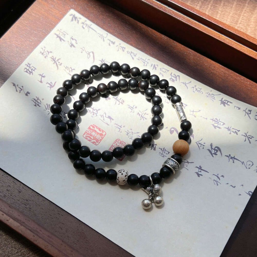 Bracelet perlé noir
