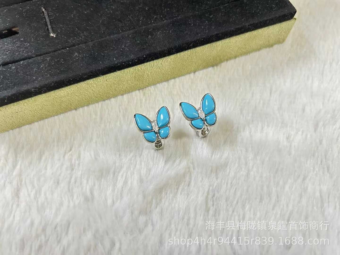 Mariposa turquesa platino