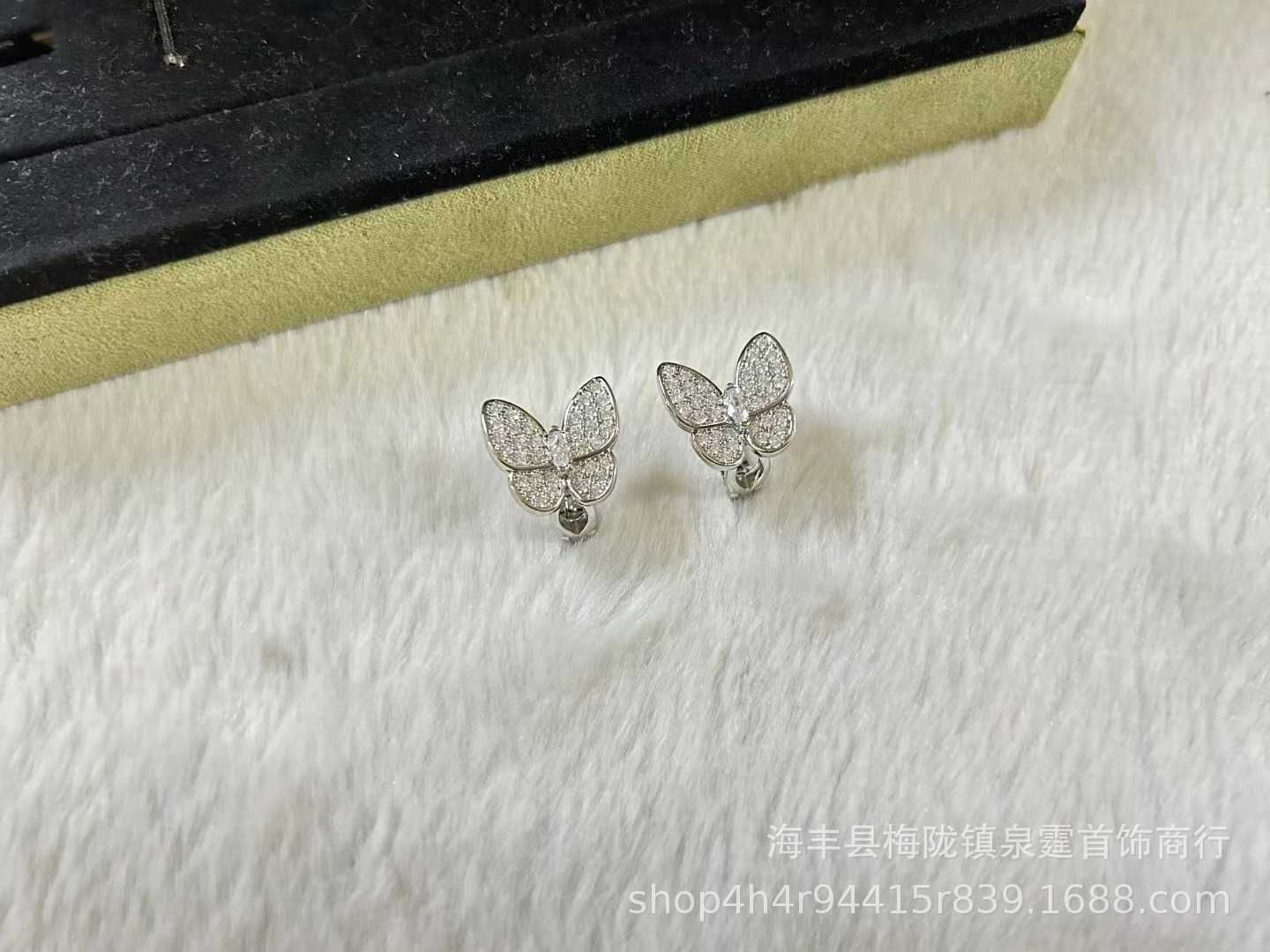 Mariposa blanca diamante platino