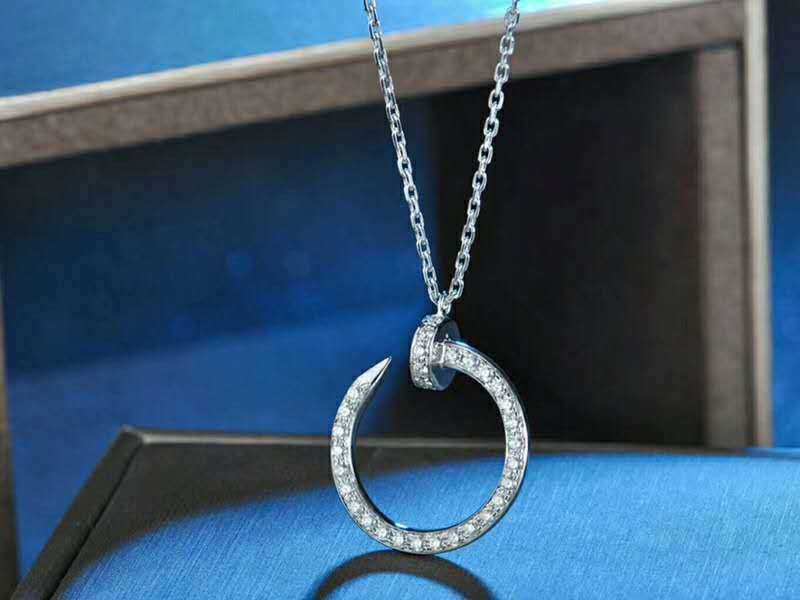 Collier ￠ ongles en diamant en platine