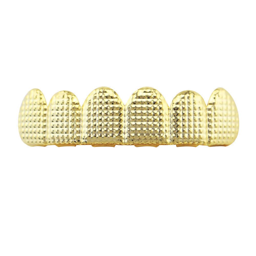 Золотая решетка верхняя часть зубов