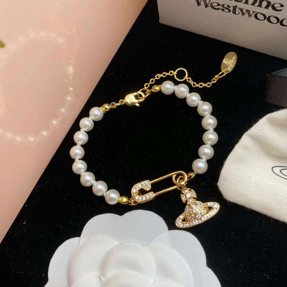 the Gold Bracelet Is Reprinted with th