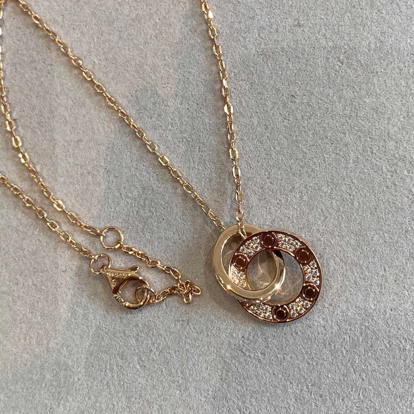 Collier double anneau d'or rose