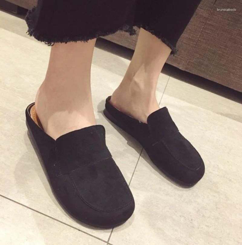 Black slippers