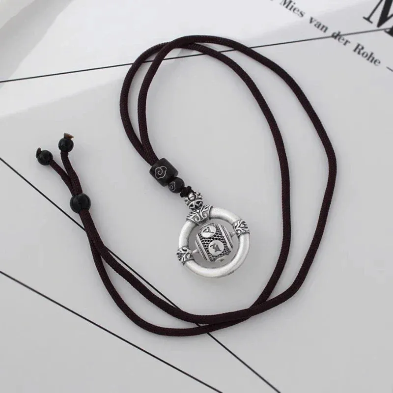 Pendentif corde noire