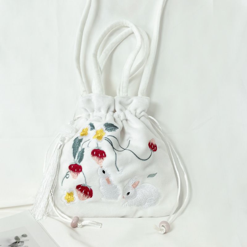 Plush rounded corner bag + embroidered s