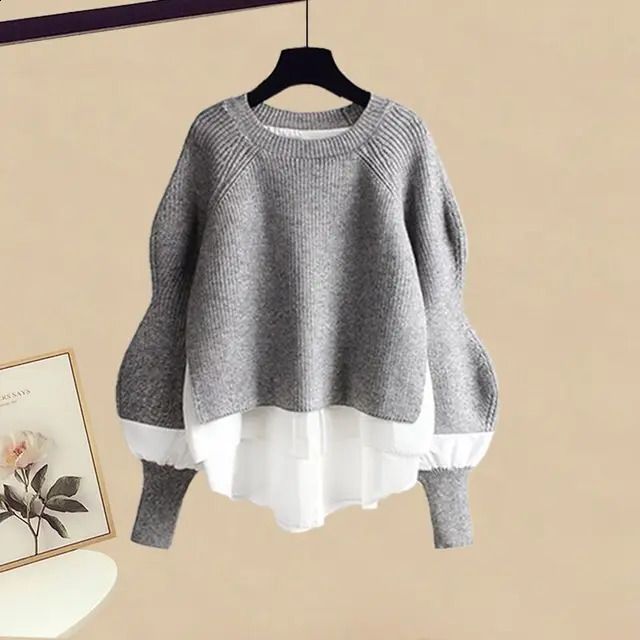 Grauer Pullover