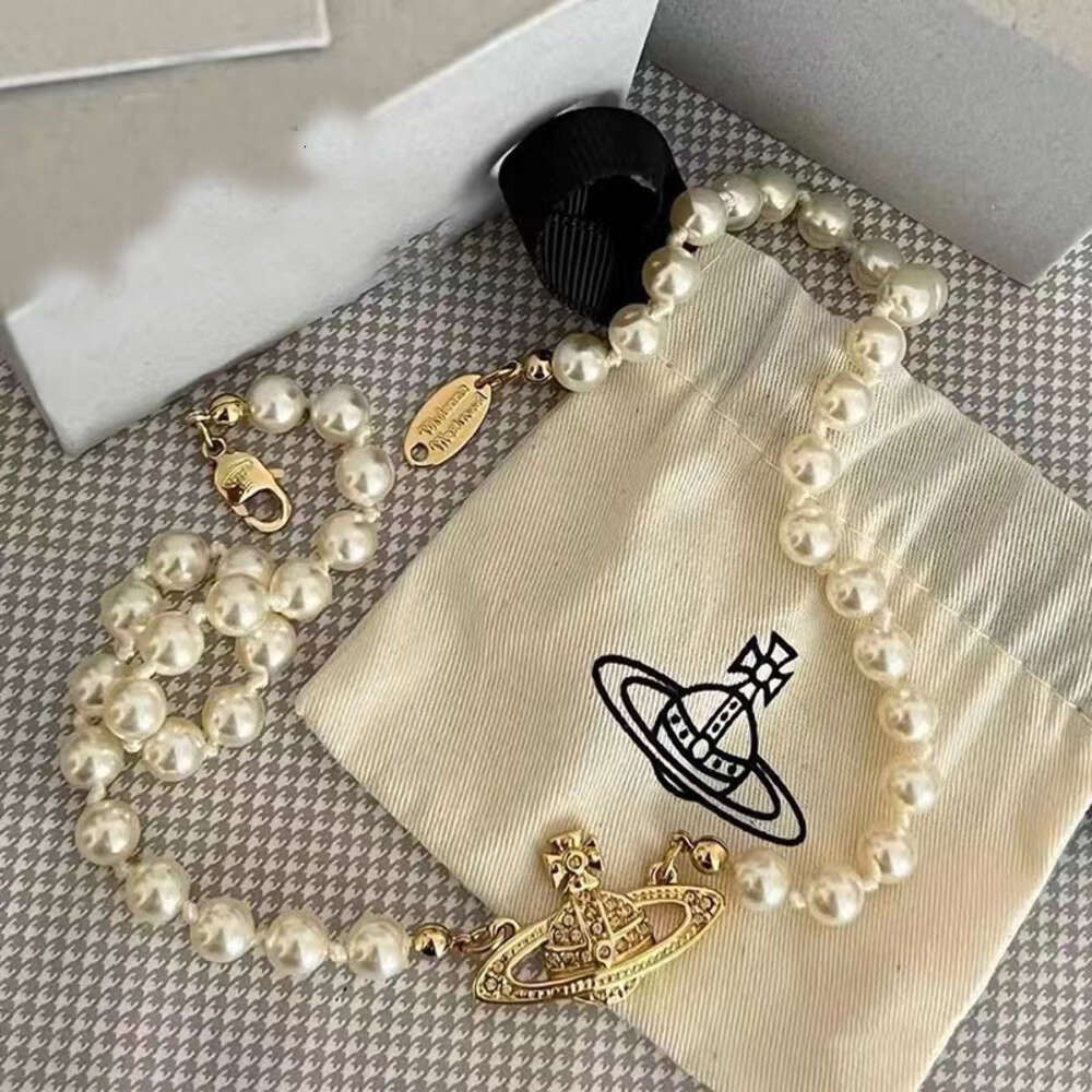 (golden) Saturn Pearl Necklace