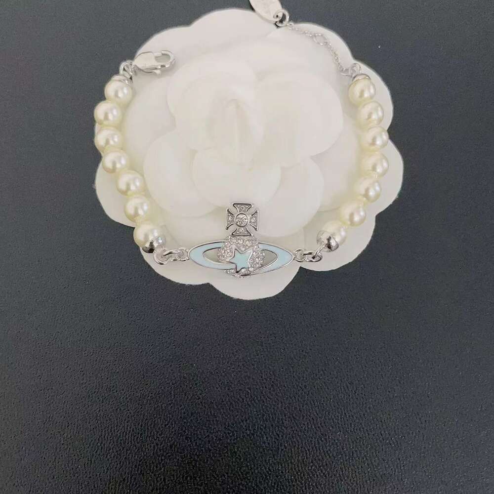 Bracciale in argento con perle azzurre