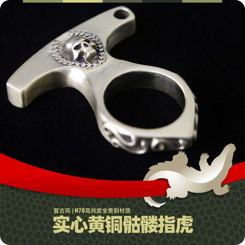 Skull head brass single finger tiger 1