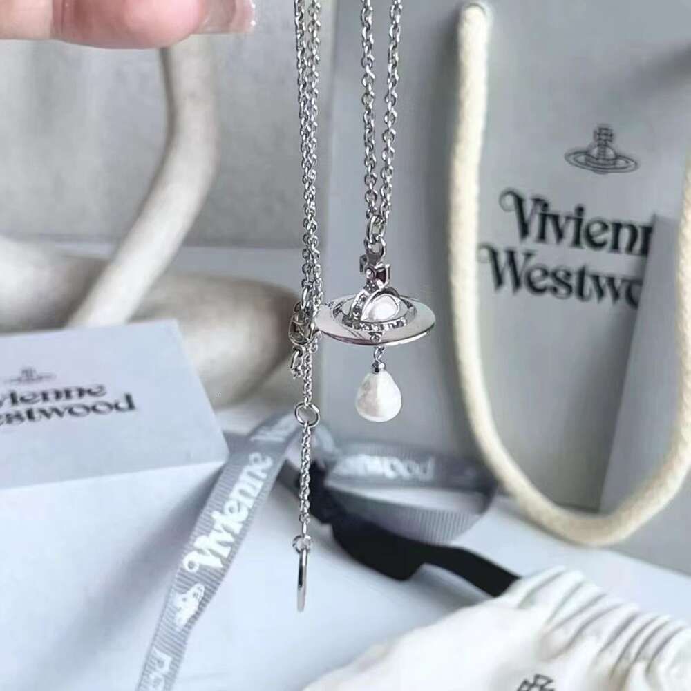 Vita pärlor+platina halsband