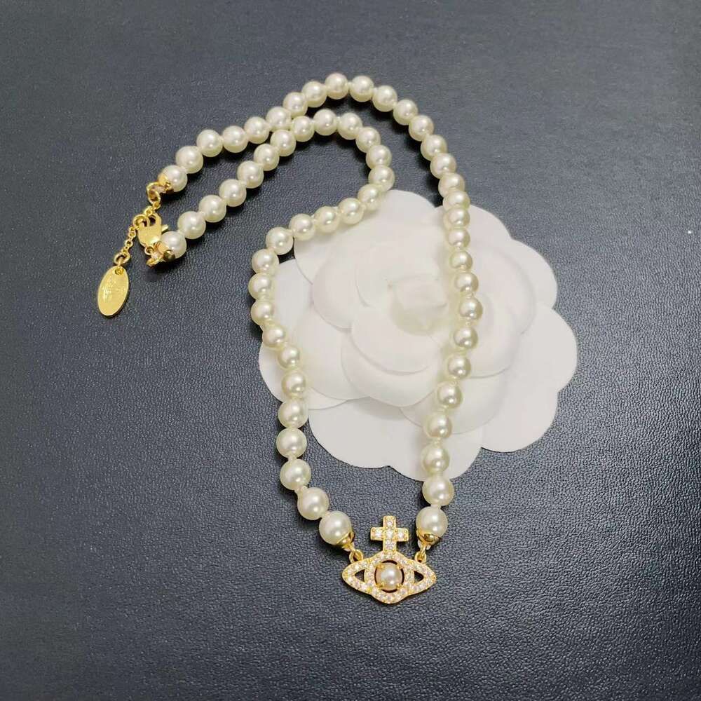New Gold Saturn Pearl Necklace