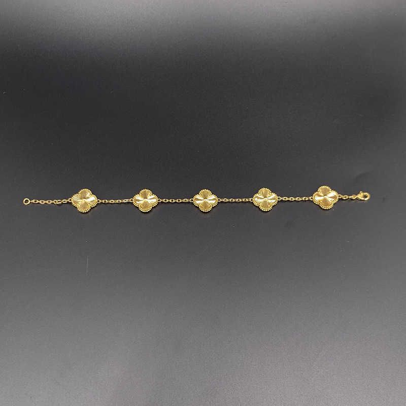 Bracelet cinq fleurs style laser doré